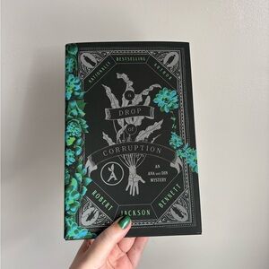 Drop of corruption by Robert Jackson Bennett